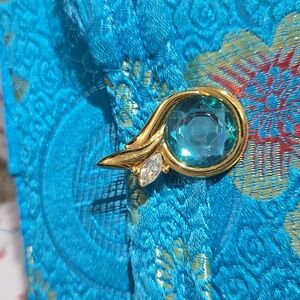 Kenneth J Lane medallion  to wear on a chain or pearls.